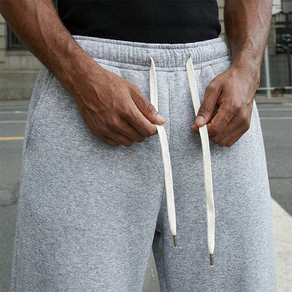 👖 Løse bukser for menn med snøring – Komfortabelt bomullsstoff, lommer og avslappet stil for hverdag og trening 🏃‍♂️